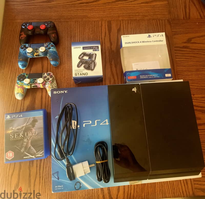 PS4 fat + 3 joysticks + 5 games + Charger doc 0