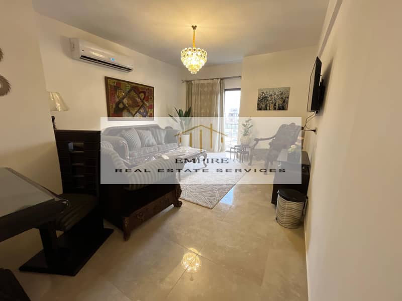 Fully Furnished Apartment with ACS' in Marasem Open View with amazing Price with everything - Looking into green areas 1