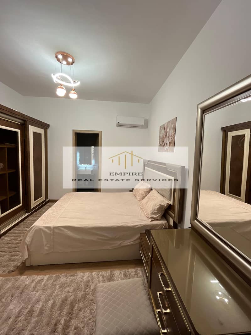 Fully Furnished Apartment with ACS' in Marasem Open View with amazing Price with everything - Looking into green areas 3