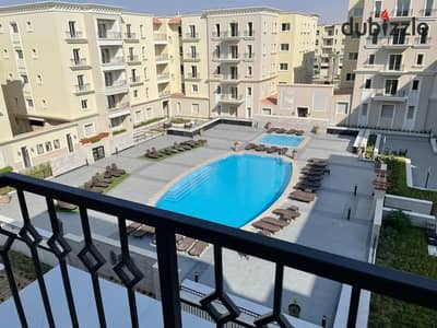 Apartment for rent in Mivida - furnished -   garden & swimming pool view