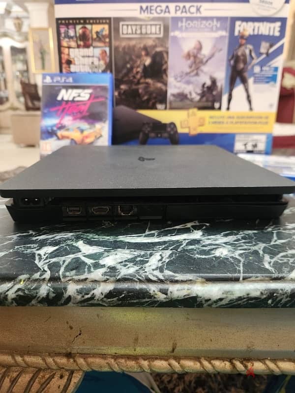 Pre-Owned PlayStation 4 used like new, with two Original consoles 2