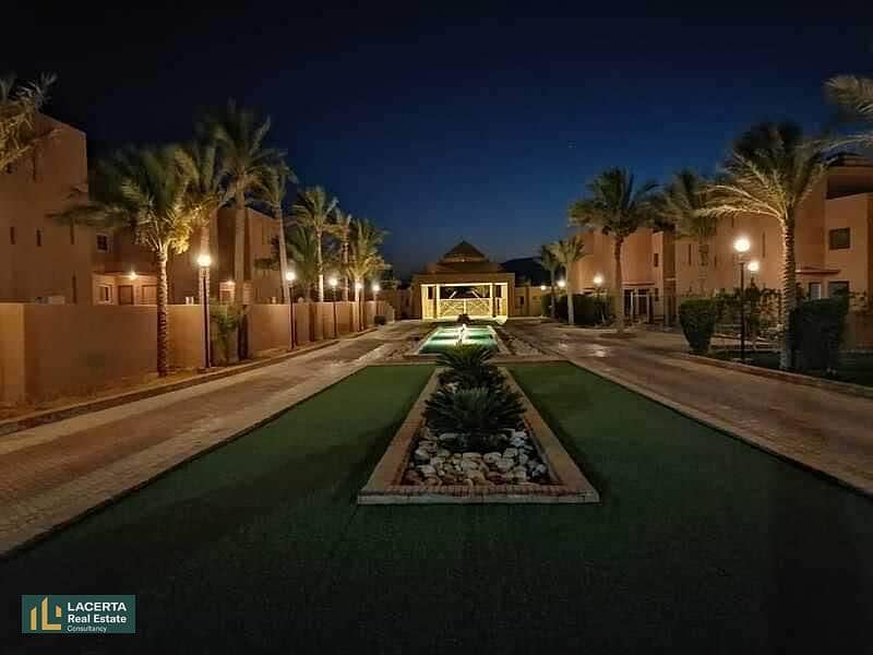 For sale, a chalet in a garden, immediate receipt, first row on the sea, in the heart of Ain Sokhna, in La Vista Garden Village, in installments over 7