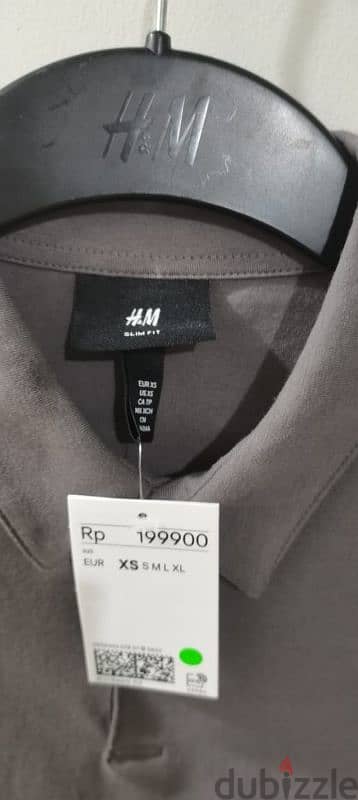 تيشرت بولو ماركة H&M بالتكت والباركود 1