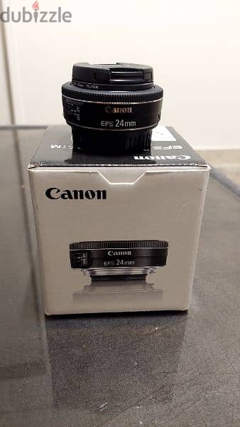 عدسه كانون ٢٤مم فتحه ٢. ٨ معاها كل حاجتها  2.8 Canon 24mm