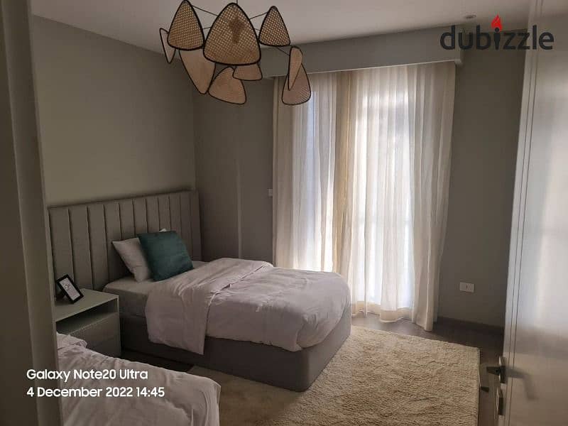 Apartment for sale, ground floor, in Garden Village West - Durrat Sheikh Zayed, immediate receipt, complete with installments, first stage 7