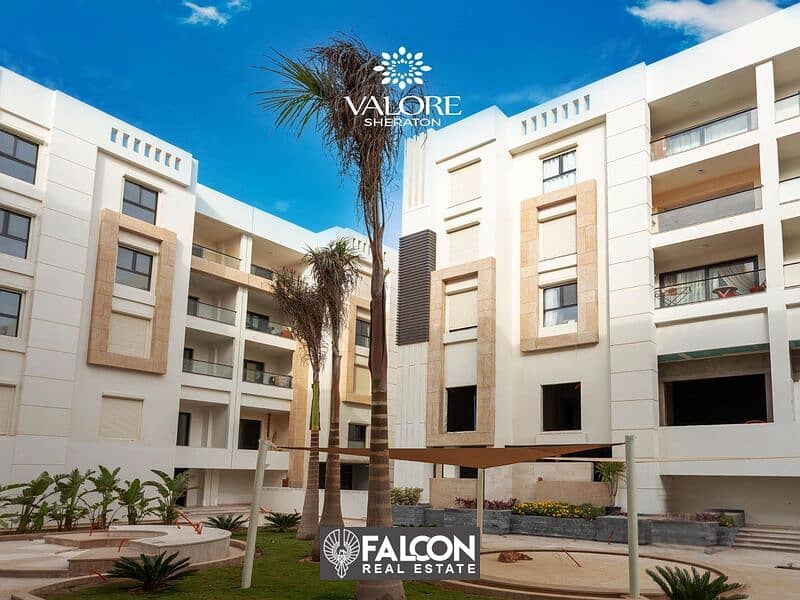 2-BR hotel apartment in front of the airport gate in Sheraton, close receipt, fully finished, in Aljar - Valore compound, next to Almaza City Center 1