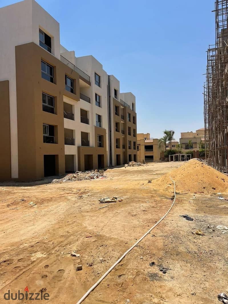 Apartment for sale in Ashgar Heights, Garden, in installments, with a view of green spaces and trees, area 105 m, semi-finished | October - October Ga 4