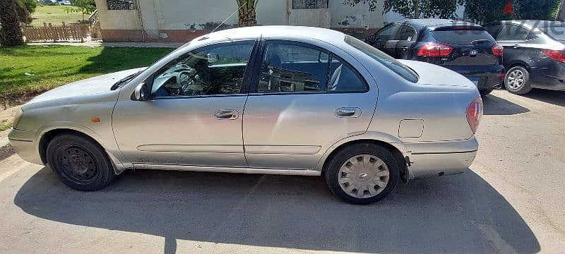 Nissan Sunny 2010 11