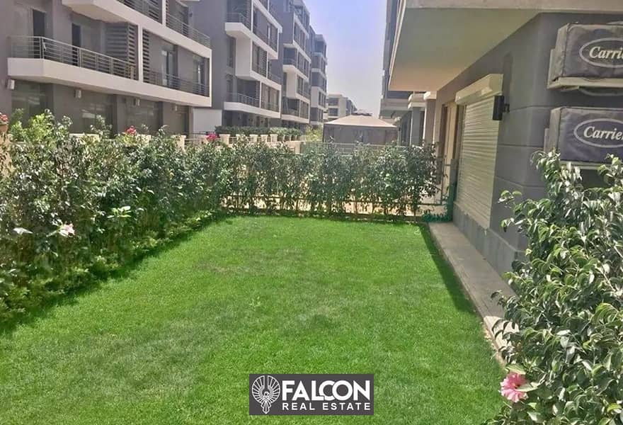 For sale, an apartment with a garden, with a 42% discount for cash and installments, in a distinguished location in Taj City, on the Suez Road 4