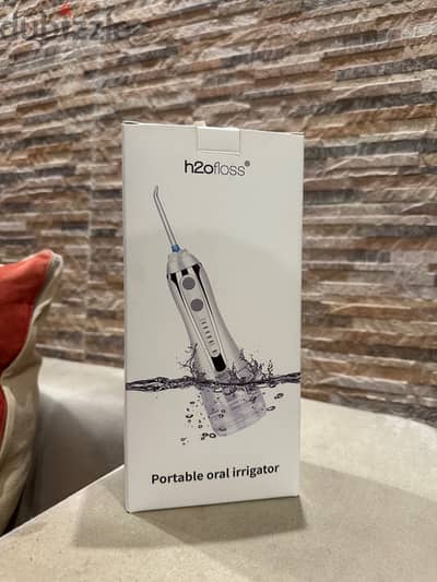 H2O Floss Portable Oral Irrigator - جهاز تنظيف الأسنان بالماء لاسلكي