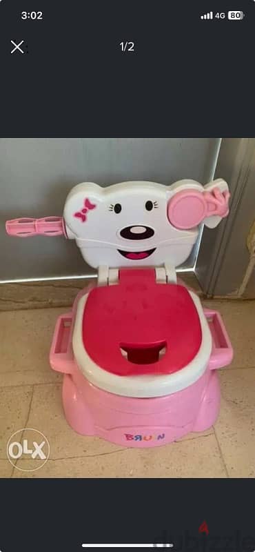 Toilet training seat with music