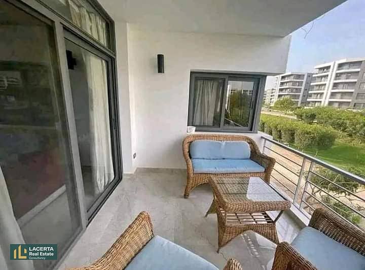 3-bedroom apartment for sale on Suez Road, directly in front of Cairo International Airport in Taj City 4