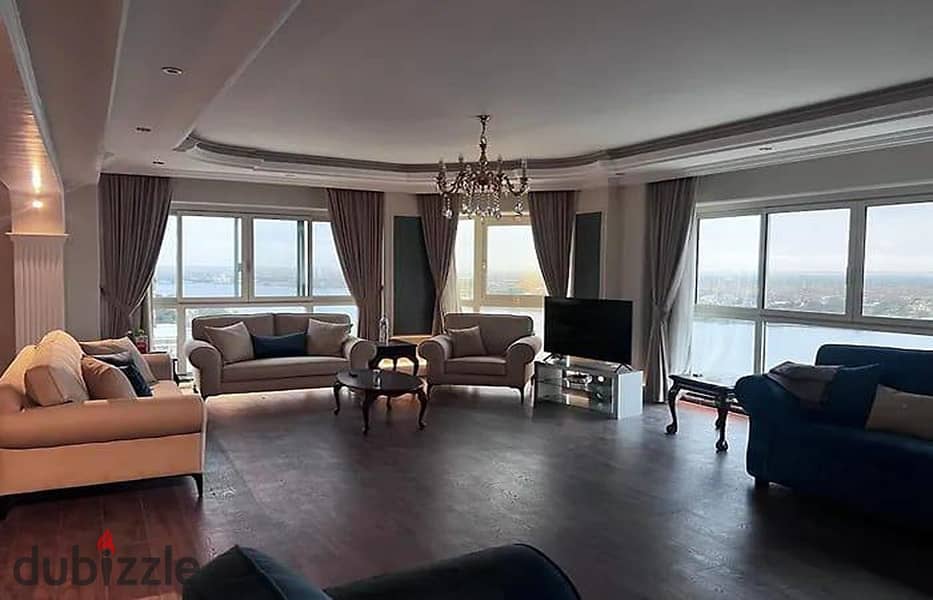 For sale in Barqa, an area in Maadi, directly on the Nile, an area of ​​390 meters, for an apartment overlooking the Corniche, the Nile, Maadi Island, 8