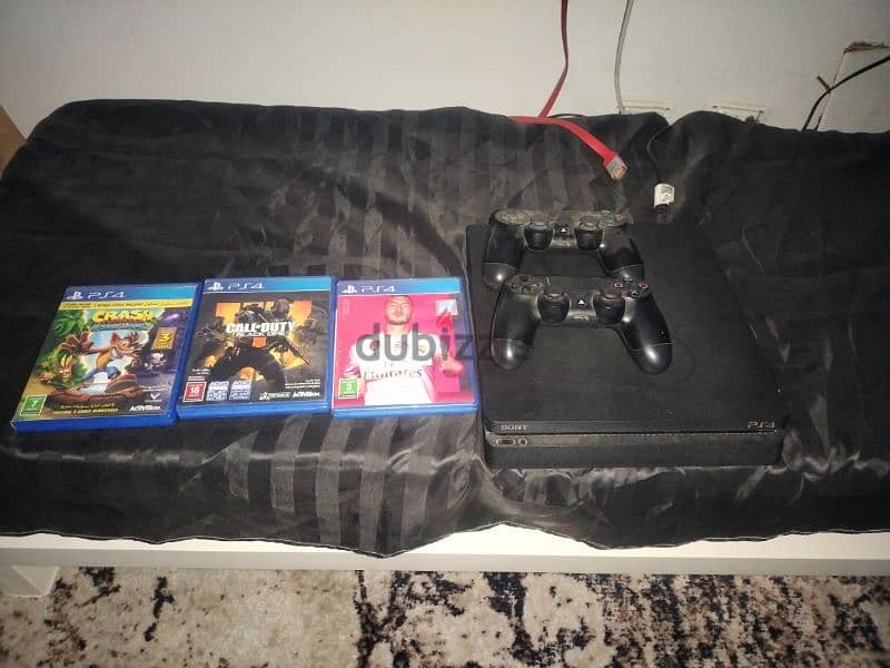 Play Station 4 slim Hard 1TB 3