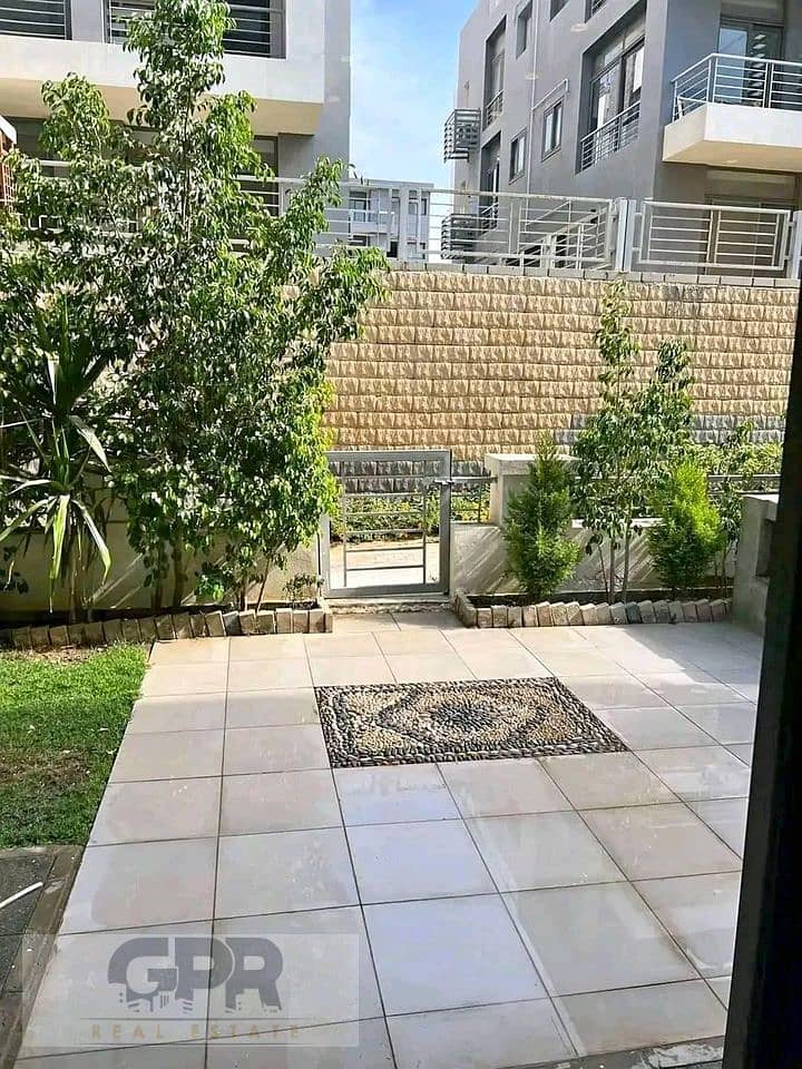 garden 3bed apartment on thawra street front of airport gate in taj city new cairo 4