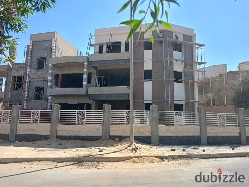 Buy a 230-meter apartment with a 230-meter garden in the ninth district, Sheikh Zayed, villa, second corner of Dahshur Link. 1