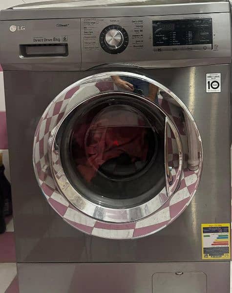 غسالة ال جي ٨كيلو LG Front Load Washing Machine 8KG With DD Motor 0