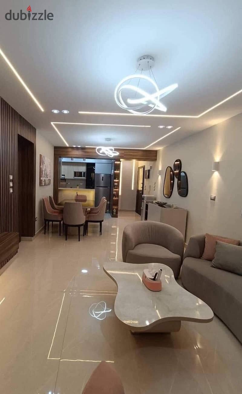 Apartment for sale directly in front of Cairo International Airport in Taj City Compound in Heliopolis, on the extension of El Thawra Street 1