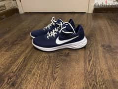 Nike revolution shoes (Original) size 45 Really good condition 0