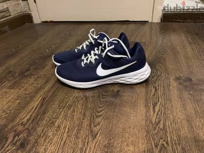 Nike revolution shoes (Original) size 45 Really good condition