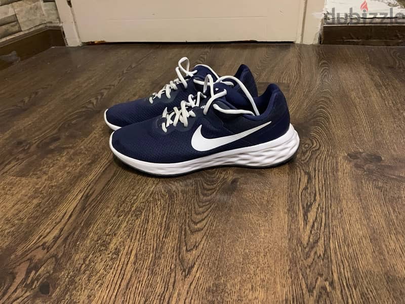 Nike revolution shoes (Original) size 45 Really good condition 0