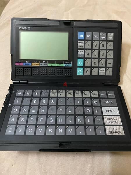 آلةً حاسبة casIo sf- 4000 0