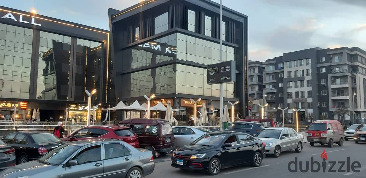 Shop for sale, 50m in front of the escalator, in the middle of the largest brands in the most famous mall in Shorouk, in front of the Green Hills Club 2