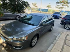 Mitsubishi Lancer 2015 بصمة و فتحة سقف