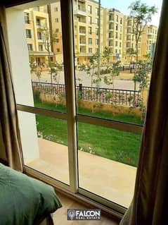 An apartment of 142 meters with a private garden of 150 meters for sale on the largest lake in New Cairo in a special location inside Sarai Compound 0