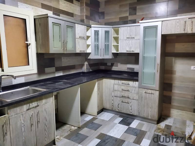 Apartment for rent at an attractive price with kitchen and air conditioners in Hayati Residence compound in front of Garden 8 1