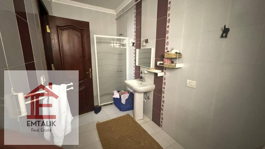 Apartment for sale in El Banafseg buildings in the Fifth Settlement, with an open view, clear entrance from 90th Street and Mohamed Naguib axis 7