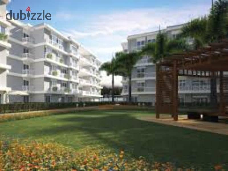 Ground apartment with 111 meter garden for sale in Green 6 Compound 6