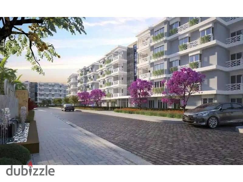 Ground apartment with 111 meter garden for sale in Green 6 Compound 7