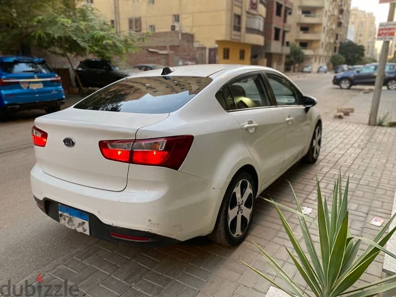 كيا ريو 2013خليجي كامله فيريكا بالكامل kia Rio 1