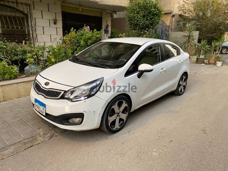 كيا ريو 2013خليجي كامله فيريكا بالكامل kia Rio 2