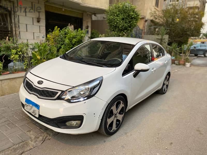 كيا ريو 2013خليجي كامله فيريكا بالكامل kia Rio 3