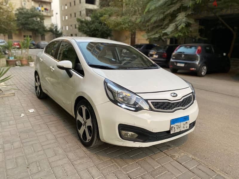 كيا ريو 2013خليجي كامله فيريكا بالكامل kia Rio 5