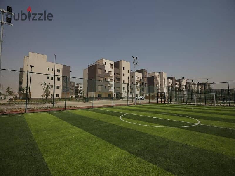 For sale, an apartment 163 m, Courtyard Compound marakez 6th of October  next to Mall of Arabia, landscape view 3