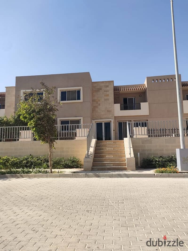 or sale, the last townhouse with a garden, 108 m, in Taj City, in front of Cairo Airport, near City Center, at the price of an apartment 6