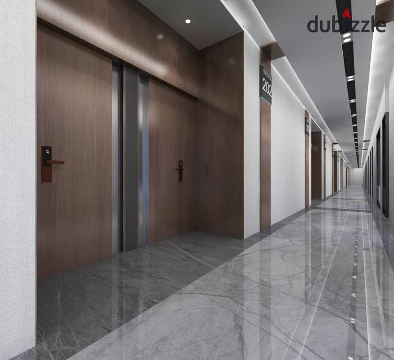 An office for rent in Trivium Mall, Sheikh Zayed, area: 71 meters, finished, with air conditioners, on the main Bustan Street 4