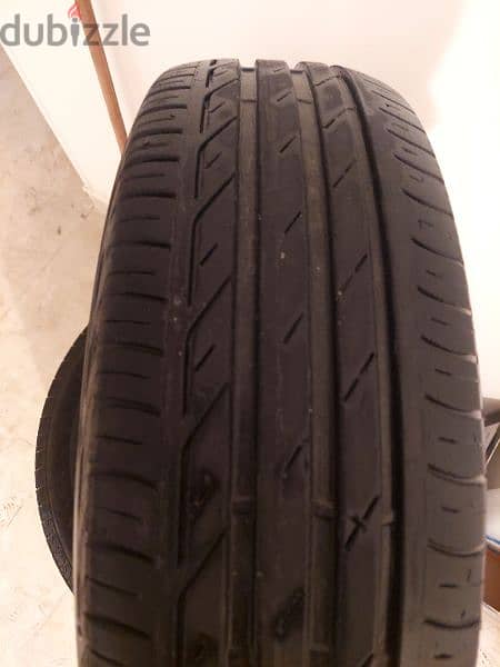 كاوتش بريدج ستون ( ياباني ) مستعمل ماشي اقل من  25 الف كيلو 185/65r15 2