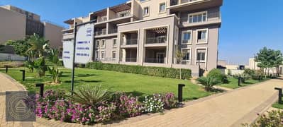 Ground With Garden Prime Location apartment for sale at October Plaza Sodic West 6th October , 15 Minutes from Shiekh Zayed