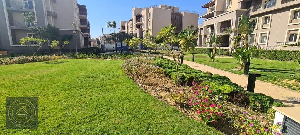 Ground With Garden Prime Location apartment for sale at October Plaza Sodic West 6th October , 15 Minutes from Shiekh Zayed 1