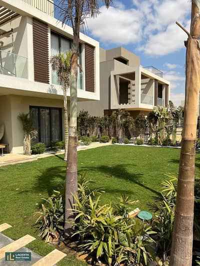 Double view villa for sale, 4 rooms, with the lowest down payment  in the market, in the heart of New Heliopolis, in the Sodic East Compound.