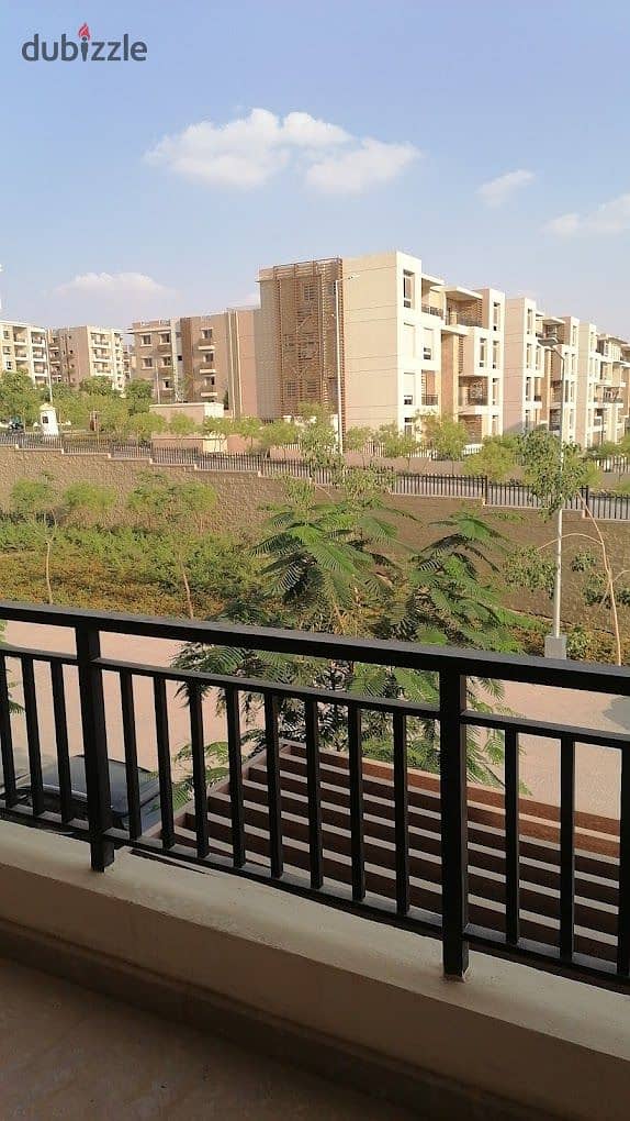 With a cash discount, I own an apartment in a garden in Taj City in front of Cairo International Airport 4