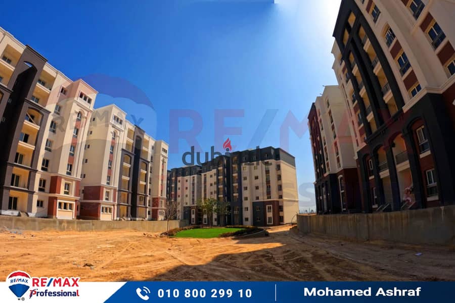 Own your apartment with open views of the largest plaza inside Alex West Compound 2