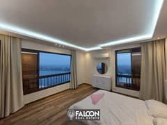 40 m hotel apartment with a full view of the Nile Corniche in Maadi, fully finished, for sale under the management of the Hilton Hotel, with a dow