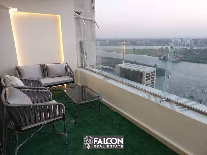 Apartment for immediate delivery, 40 square meters, with a full view of the Nile Corniche, Maadi, fully finished, for sale under the management of the 6