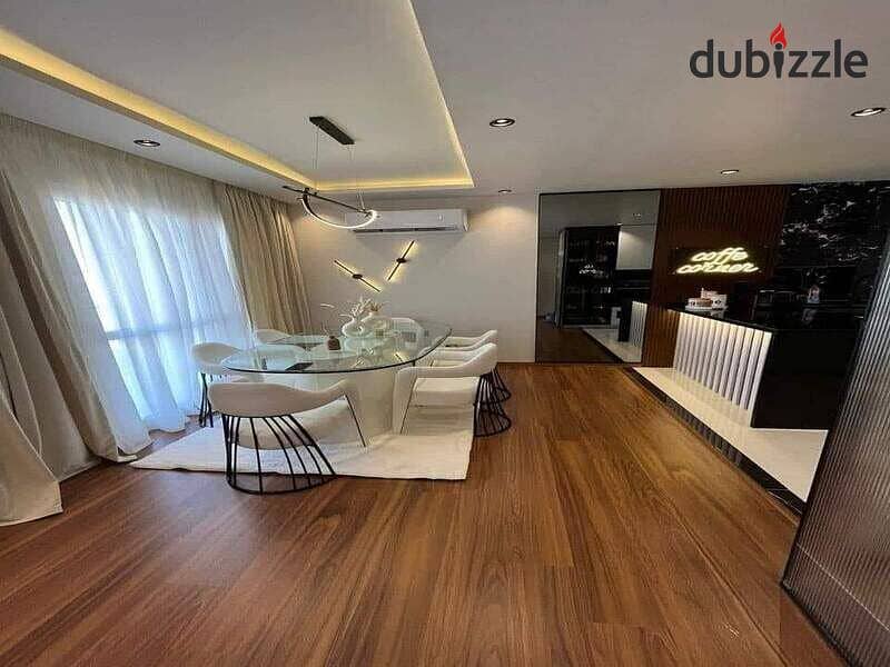 APARTMENT FOR SALE, ready to move, FULLY FINISHED, IN AL MAQSAD COMPOUND WITH OPEN VIEW IN THE ADMINISTRATIVE CAPITAL IN THE AREA OF R3 3