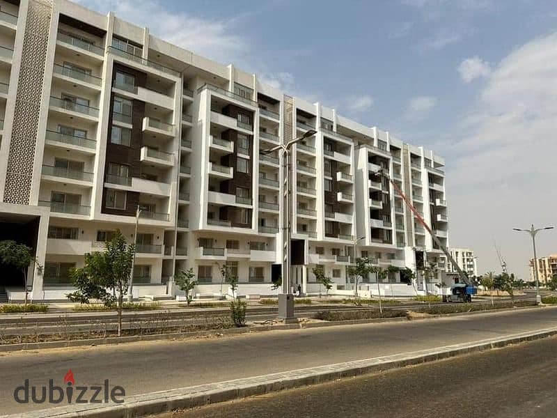 APARTMENT FOR SALE, ready to move, FULLY FINISHED, IN AL MAQSAD COMPOUND WITH OPEN VIEW IN THE ADMINISTRATIVE CAPITAL IN THE AREA OF R3 7